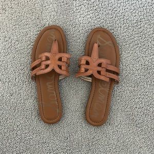 Brown sandals.